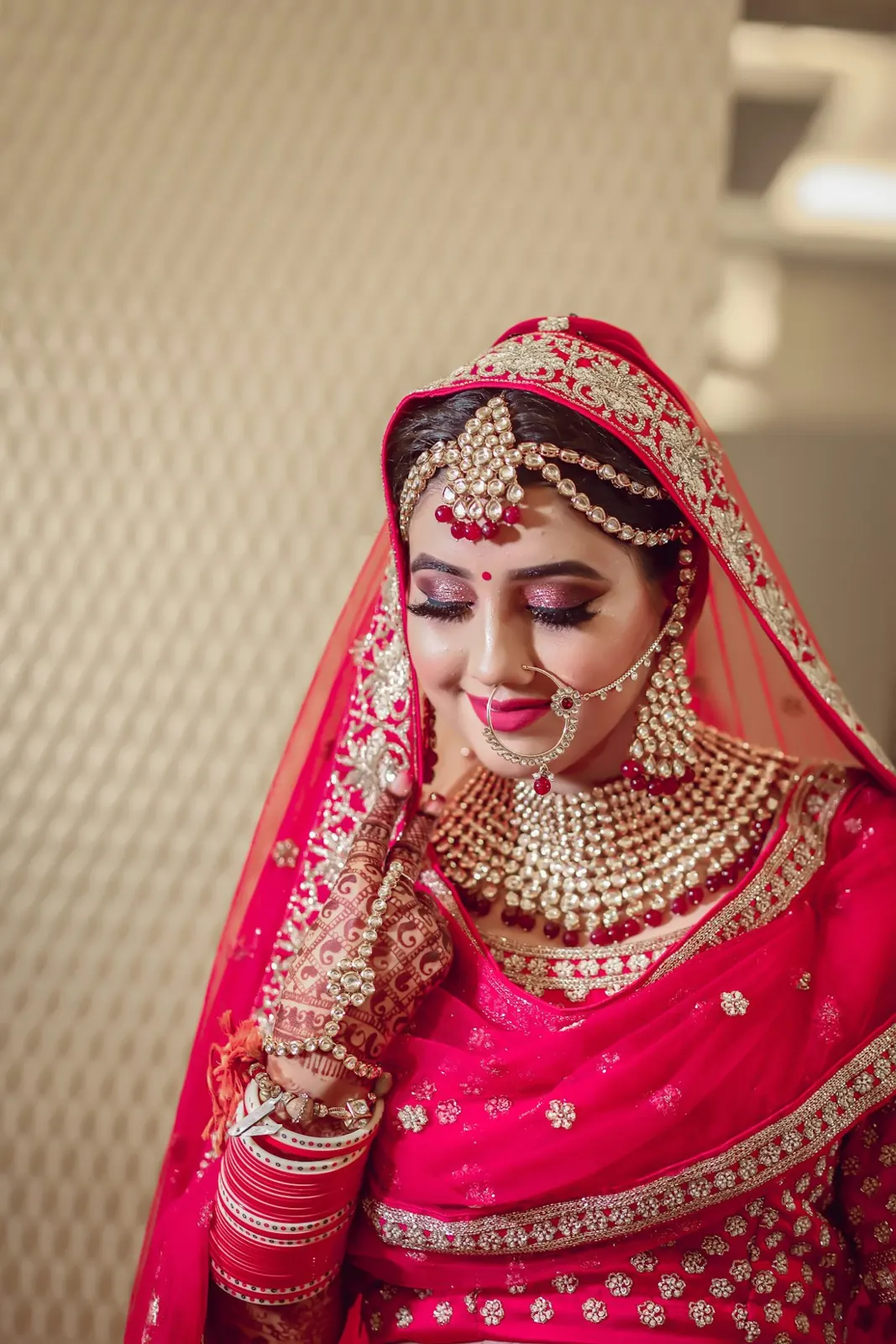 Portrait of a bride in traditional red bridal attire