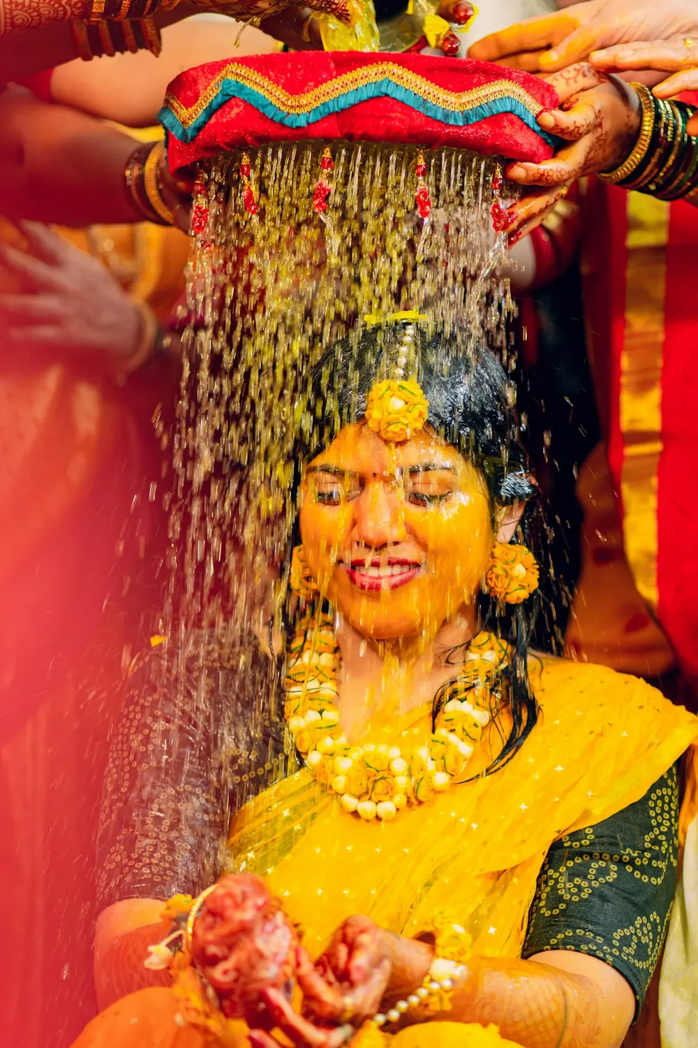 Bride during a joyful haldi ceremony